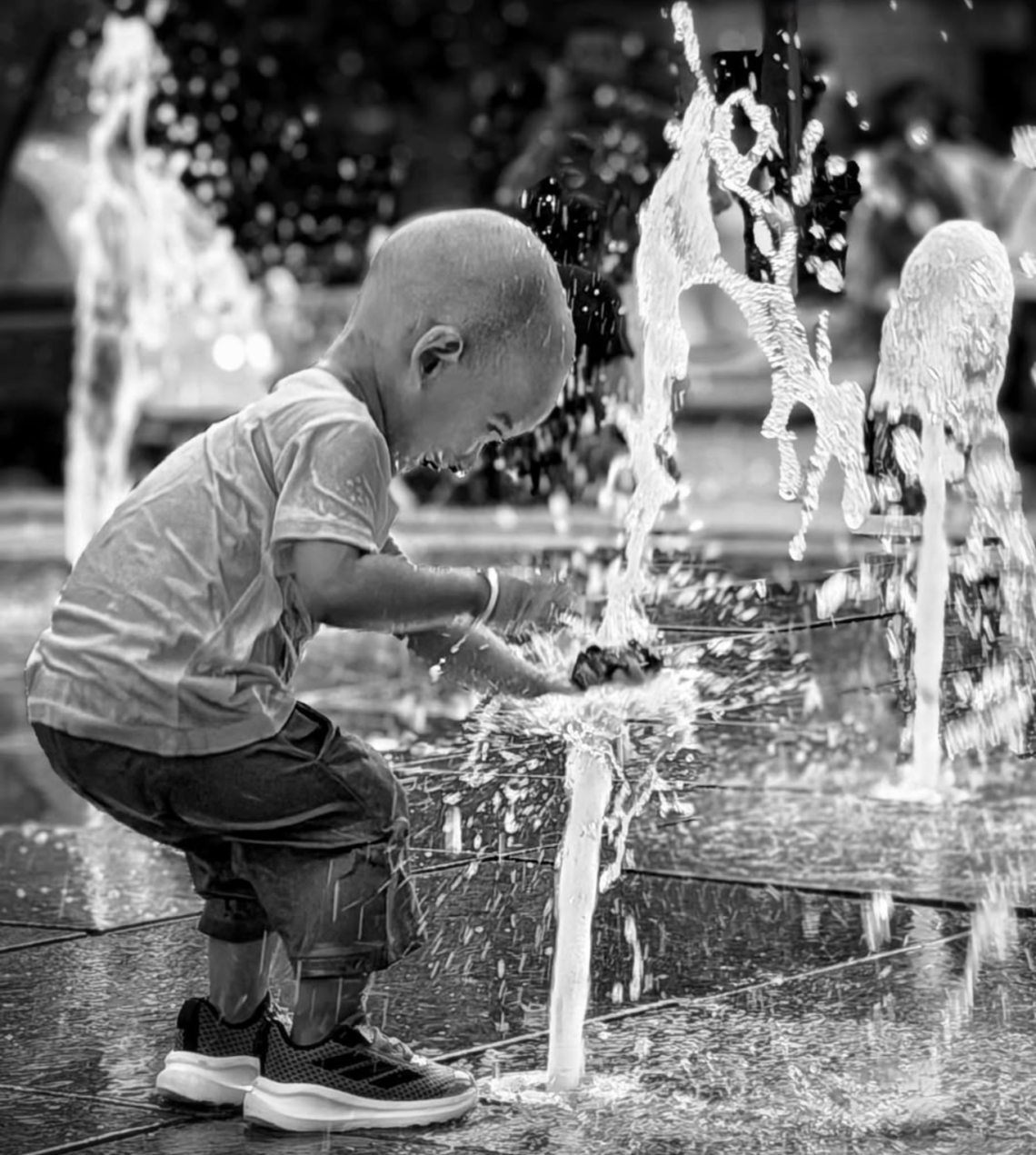 young boy in water