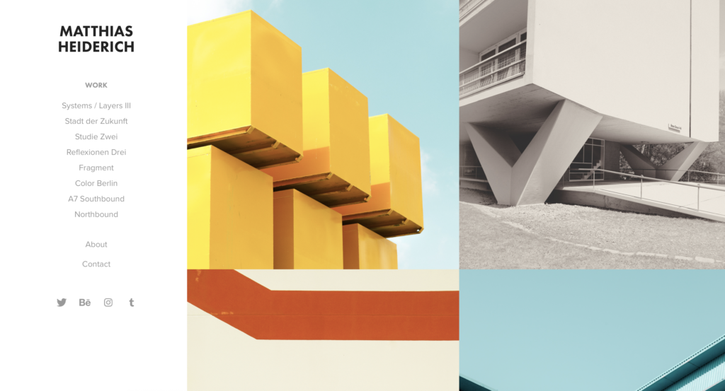 Yellow geometric architectural forms against pale blue sky