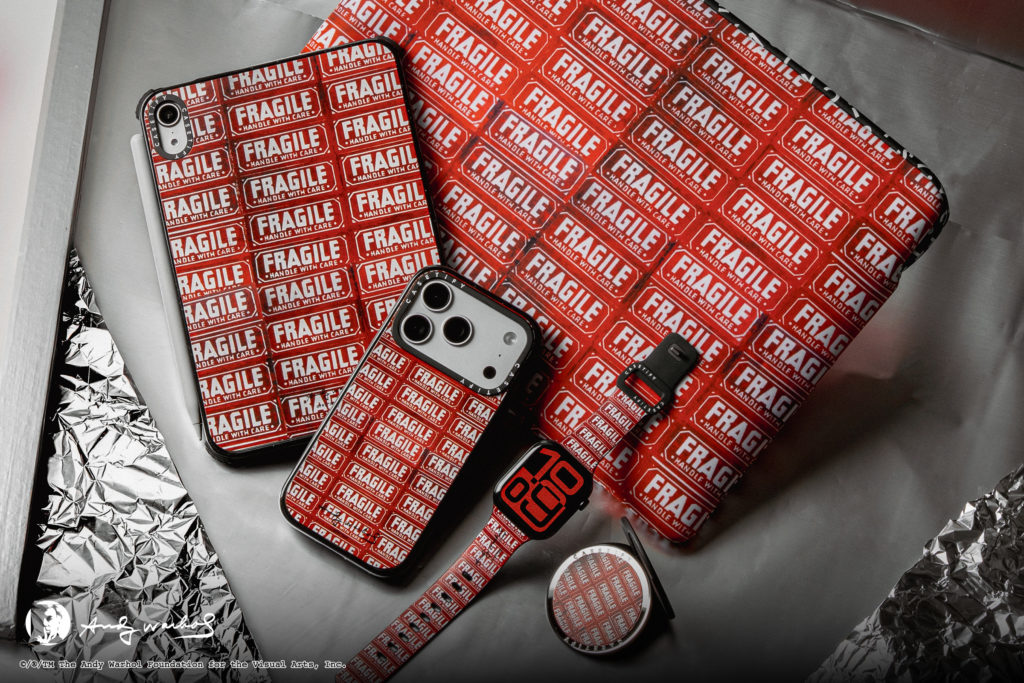 Andy Warhol Fragile collection by CASETiFY featuring iPhone cases, iPad cover, Apple Watch band and MagSafe accessory inspired by Warhol's iconic Fragile shipping label artwork.