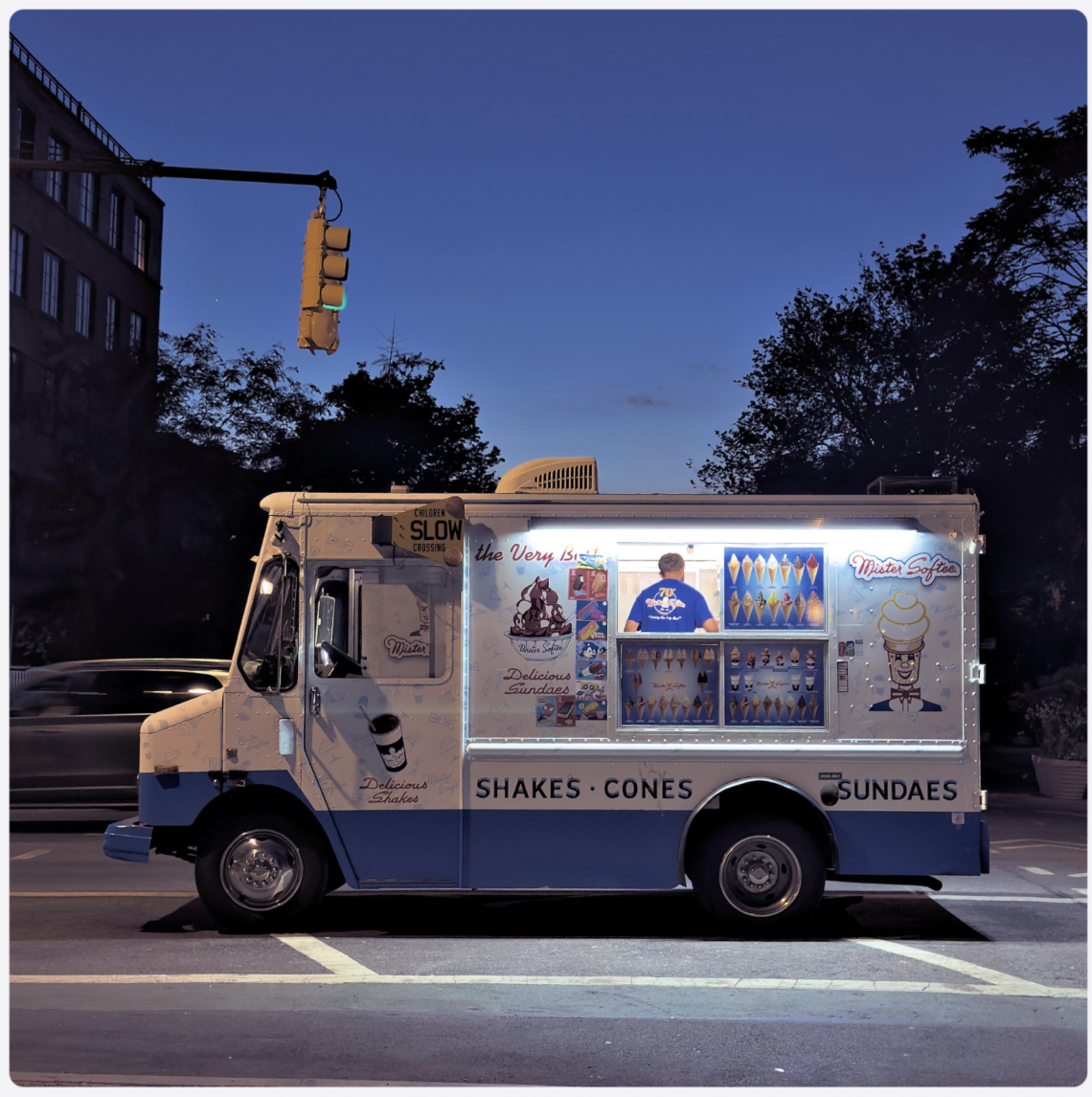 icecream truck on a road in the US in the blue hour