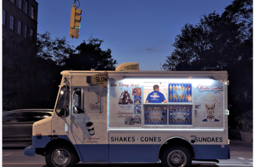 icecream truck on a road in the US in the blue hour