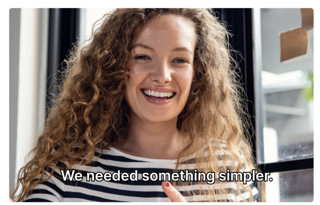 Descript AI promotional image showing a smiling woman speaking during a video recording, illustrating the platform's AI-powered video editing, transcription and content creation capabilities.