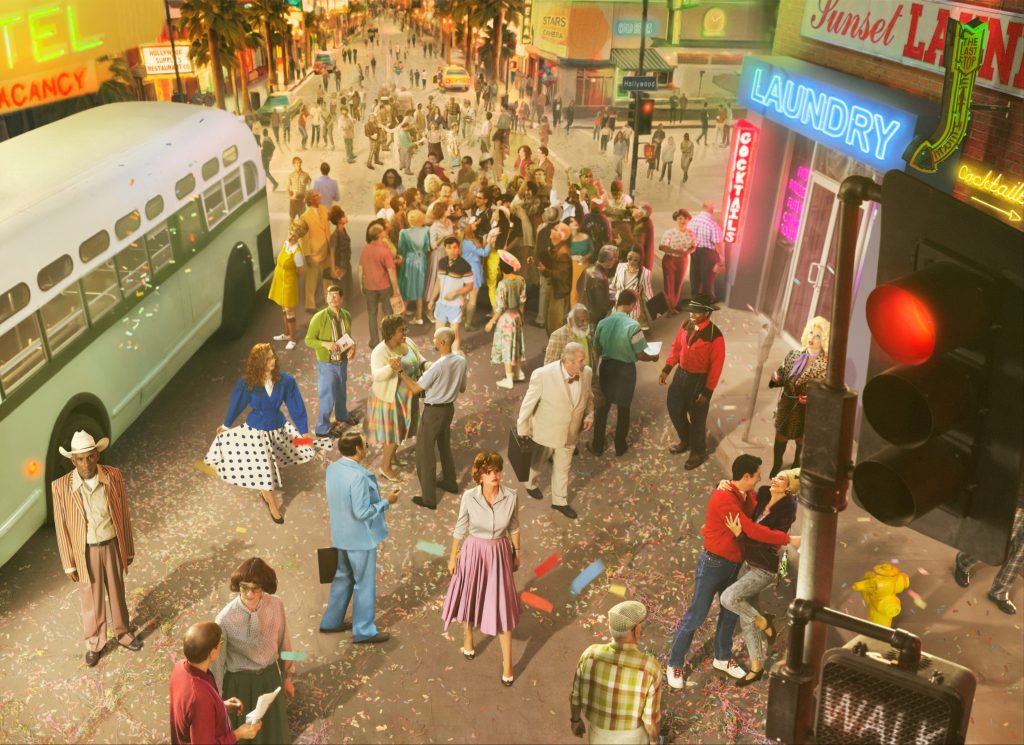 Alex Prager overhead photograph of pedestrians in vivid retro clothing moving through a street covered with colourful confetti.